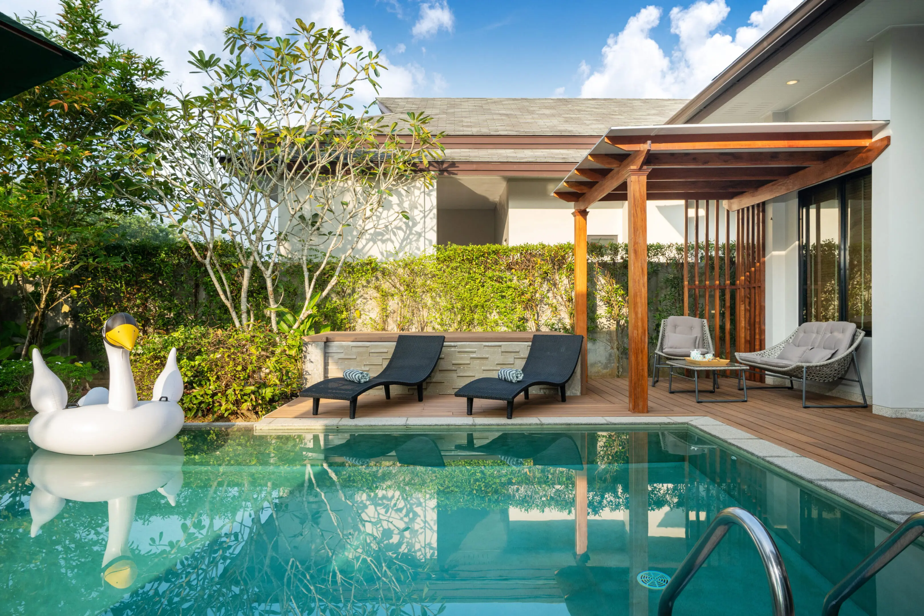 Swimming pool in tropical garden pool villa feature floating balloon Swimming pool in tropical garden pool villa feature floating balloon